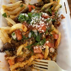 Mumpys street eats - Half eaten asada fries