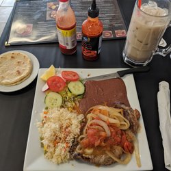 Horchata and bistec encebollado (steak, no green peppers)