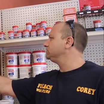 Fillbach Wood Floors - a man in a store - Flooring Near Me Fillbach Wood Floors - a man in a store - Flooring Near Me