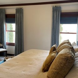 Essex House Interiors - Custom drapes and shades.