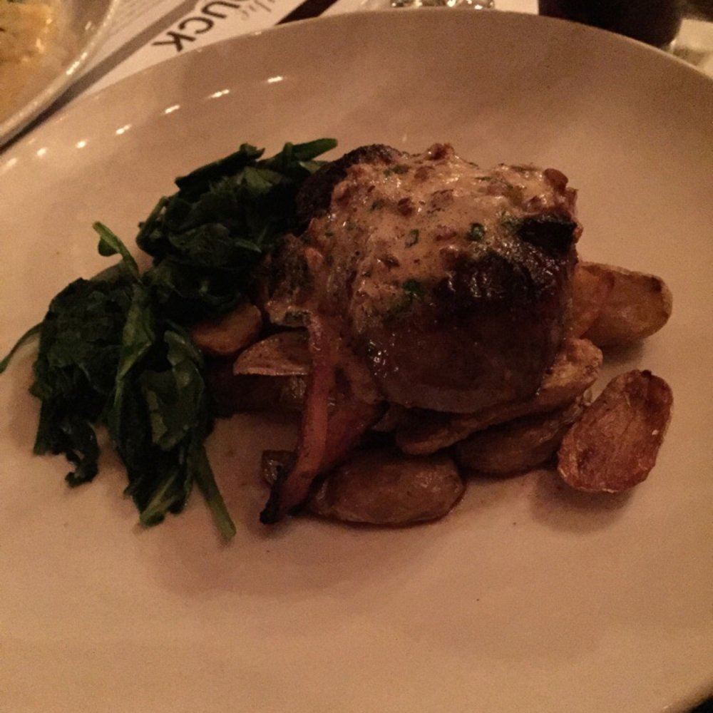 The Duck - Bacon wrapped filet with spicy pecan butter, fingerling potatoes, and braised spinach. - New American Near Me - Sturbridge, Massachusetts The Duck - Bacon wrapped filet with spicy pecan butter, fingerling potatoes, and braised spinach. - New American Near Me - Sturbridge, Massachusetts