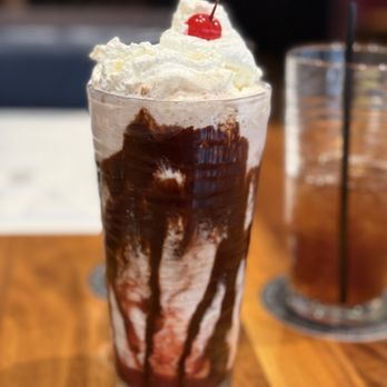 BRU Burger Bar - Hand scooped vanilla milkshake w/ chocolate & strawberry drizzle - Burgers Near Me - South Bend, Indiana