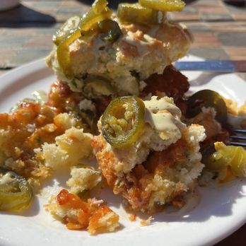 Maverick Biscuit - Nashville hot chicken on a Jalapeño biscuit. - Comfort Food Near Me - Taylors, South Carolina Maverick Biscuit - Nashville hot chicken on a Jalapeño biscuit. - Comfort Food Near Me - Taylors, South Carolina