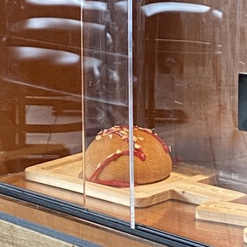 Papparoti US - Signature Bun with raspberry sauce in display case - Coffee & Tea Near Me - Farmington Hills, Michigan Papparoti US - Signature Bun with raspberry sauce in display case - Coffee & Tea Near Me - Farmington Hills, Michigan