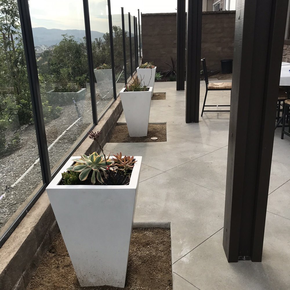 Green's Landscaping - a patio with a view - Landscaping Near Me