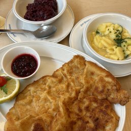 Wienerschnitzel, red cabbage, potato salad Wienerschnitzel, red cabbage, potato salad