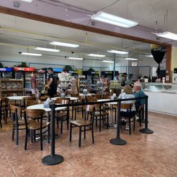 OBX Deli & Cheesesteaks - Seating area & Ice cream, candy, drinks & trinkets