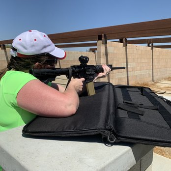 Guns Up Firearms Training and Consulting - Wife aiming in on target. - Firearm Training Near Me - Menifee, California