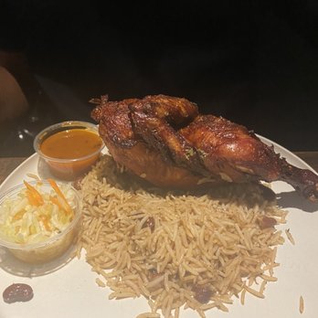Zeke's Kitchen & Bar - Roasted chicken and red rice - New American Near Me - Smyrna, Georgia Zeke's Kitchen & Bar - Roasted chicken and red rice - New American Near Me - Smyrna, Georgia