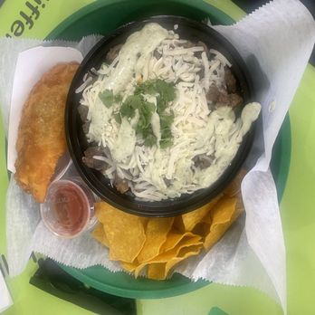 Latin Bowl Restaurant-Brandon - Rice bowl with steak and at the side is a empanada - Caribbean Near Me - Brandon, Florida Latin Bowl Restaurant-Brandon - Rice bowl with steak and at the side is a empanada - Caribbean Near Me - Brandon, Florida