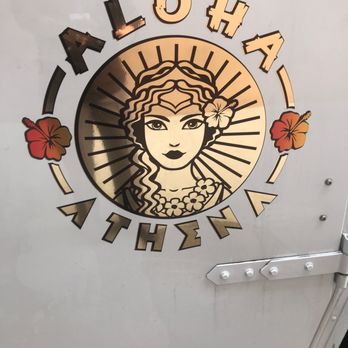 Aloha Athena - a woman's face on the door - Mediterranean Near Me
