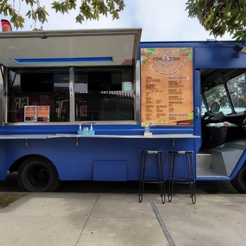 Corazon Maya - a blue food truck parked on the side of the road - Caterers Near Me Corazon Maya - a blue food truck parked on the side of the road - Caterers Near Me