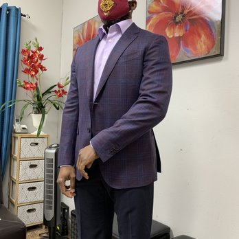 Minh's Master Tailor & Alterations - Full alterations sleeve fictional button holes and sides taken in. - Sewing & Alterations Near Me - Orlando, Florida