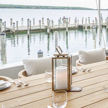 Si Si Restaurant - From the restaurant's website: view from the marina-side tables. - Mediterranean Near Me - East Hampton, New York Si Si Restaurant - From the restaurant's website: view from the marina-side tables. - Mediterranean Near Me - East Hampton, New York