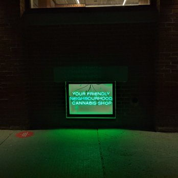 Superette - Neon signage for the store's windows as viewed from the sidewalk outside. December 2020 - Cannabis Dispensaries Near Me - Toronto, Ontario