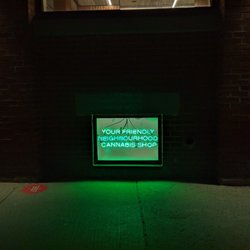 Superette - Neon signage for the store's windows as viewed from the sidewalk outside. December 2020
