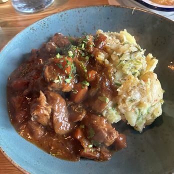The Mayflower - Lamb Stew, house potato salad - Pubs Near Me - London, XGL The Mayflower - Lamb Stew, house potato salad - Pubs Near Me - London, XGL