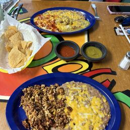 Huevos con Chorizo, chips and salsa, Huevos rancheros with chile con carne Huevos con Chorizo, chips and salsa, Huevos rancheros with chile con carne