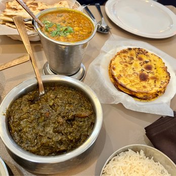 Urban Tadka - a variety of indian food on a table - Indian Near Me - Irving, Texas Urban Tadka - a variety of indian food on a table - Indian Near Me - Irving, Texas