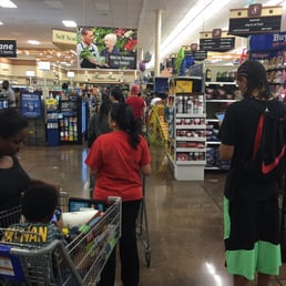 people shopping in a grocery store