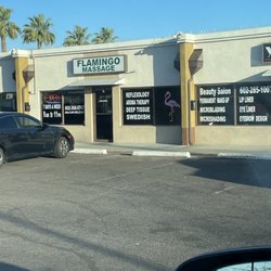 Asian Massage Flamingo Spa - Front window says open until 11pm every day.