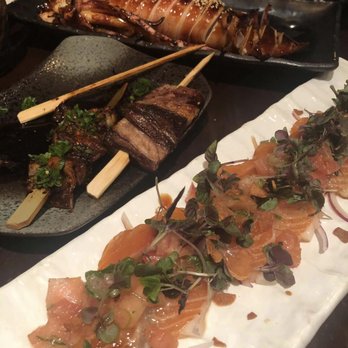 Kiraku - I would order the jumbo squid and salmon carpaccio but not the skewered beef tongue - Tapas/Small Plates Near Me - Berkeley, California