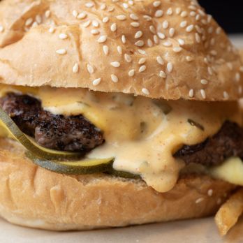 The People’s Courts - Our signature Pickle Burger with housemade zucchini pickles and tangy burger sauce. - Pickleball Near Me - Portland, Oregon The People’s Courts - Our signature Pickle Burger with housemade zucchini pickles and tangy burger sauce. - Pickleball Near Me - Portland, Oregon