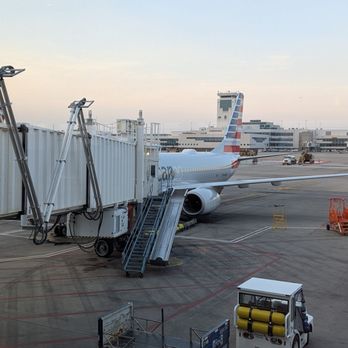 American Airlines - Waiting to board at DEN - Airlines Near Me - Denver, Colorado American Airlines - Waiting to board at DEN - Airlines Near Me - Denver, Colorado