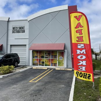 Meco Smoke Distribution - Business front and parking - Vape Shops Near Me - Miami, Florida Meco Smoke Distribution - Business front and parking - Vape Shops Near Me - Miami, Florida