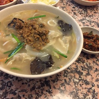 Mdk Noodles - Kalguksu or chicken noodle soup (most popular dish - thinly sliced noodles with vegetables, ground chicken and three pork dumplings) - Korean Near Me - Anaheim, California Mdk Noodles - Kalguksu or chicken noodle soup (most popular dish - thinly sliced noodles with vegetables, ground chicken and three pork dumplings) - Korean Near Me - Anaheim, California