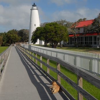 Ocracoke Island Lighthouse - The walkway to the lighthouse (with the "lighthouse cat") - Landmarks & Historical Buildings Near Me - Ocracoke, North Carolina Ocracoke Island Lighthouse - The walkway to the lighthouse (with the "lighthouse cat") - Landmarks & Historical Buildings Near Me - Ocracoke, North Carolina