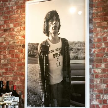 Roni's - Mick jagger poster on the wall - American Near Me - Beverly Hills, California Roni's - Mick jagger poster on the wall - American Near Me - Beverly Hills, California