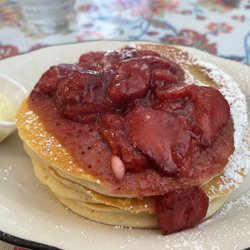 Village Pancake House - Banana pancakes and strawberry sauce
