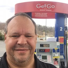 a man at a gas station