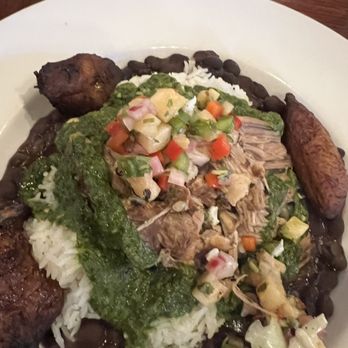 Hemingway's Tavern - Tropical Plate. rice beans pork - New American Near Me - Melbourne, Florida
