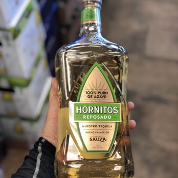 Liquor Stores - a hand holding a bottle of hornitos - Beer, Wine & Spirits Near Me - Magna, Utah Liquor Stores - a hand holding a bottle of hornitos - Beer, Wine & Spirits Near Me - Magna, Utah
