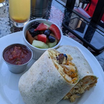 Let’s Yolk About It - Breakfast burrito with side of salsa and fruit - Breakfast & Brunch Near Me - Long Beach, California Let’s Yolk About It - Breakfast burrito with side of salsa and fruit - Breakfast & Brunch Near Me - Long Beach, California
