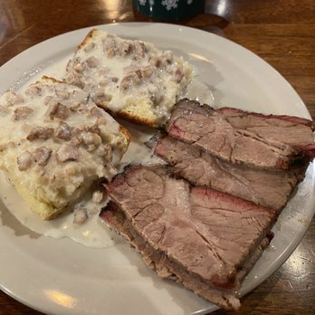 Double Barrel BBQ - Half order biscuit and gravy. Add sliced brisket. Very tender. - Barbeque Near Me - Sedro-Woolley, Washington