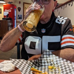 My husband having a beer after a long trip.