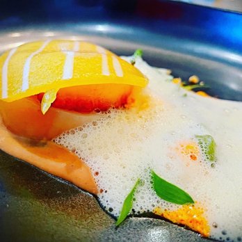 Zero Restaurant + Bar - Barely cooked scallop, tropical fruit, Thai curry - New American Near Me - Charleston, South Carolina Zero Restaurant + Bar - Barely cooked scallop, tropical fruit, Thai curry - New American Near Me - Charleston, South Carolina