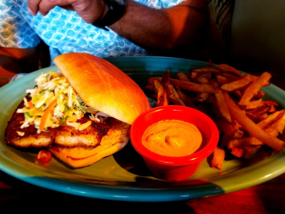 Order TRADER VIC'S FISH SANDWICH food online from Hula's Island Grill store, Santa Cruz on bringmethat.com