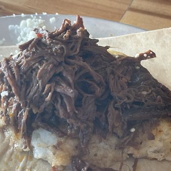 Little Chango - Halfway eaten Arepa with Ropa Vieja. Sorry was hungry before I took the pic. Delicious! - Spanish Near Me - Asheville, North Carolina Little Chango - Halfway eaten Arepa with Ropa Vieja. Sorry was hungry before I took the pic. Delicious! - Spanish Near Me - Asheville, North Carolina