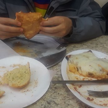 Primavera Pizzaria - Meat calzone. Eggplant parmesan and garlic bread. Very delicious. - Pizza Near Me - Bronx, New York Primavera Pizzaria - Meat calzone. Eggplant parmesan and garlic bread. Very delicious. - Pizza Near Me - Bronx, New York