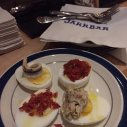 JarrBar - Eggs with chorizo, tuna, piquillo peppers and anchovies.