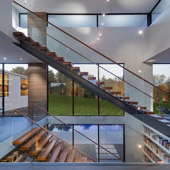 DJR Contracting - a modern home with a glass staircase - General Contractors Near Me DJR Contracting - a modern home with a glass staircase - General Contractors Near Me