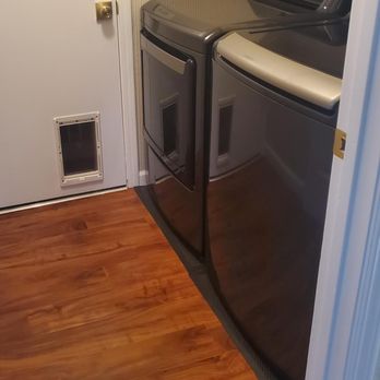 Floor Aesthetics - Laundry room acacia laminate after - Flooring Near Me