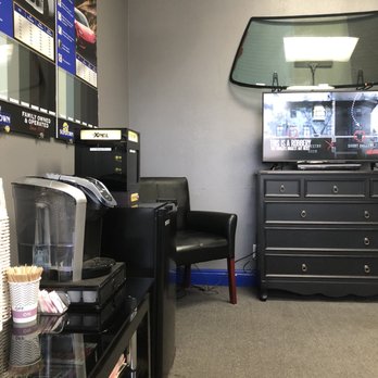 Sundown Window Tinting - Waiting room view from comfy loveseat. They had drinks in the fridge for customers. - Shades & Blinds Near Me - Riverside, California