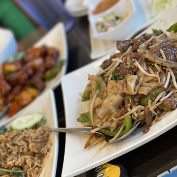 Basil Delight - a variety of asian food on plates - Thai Near Me - Pleasanton, California Basil Delight - a variety of asian food on plates - Thai Near Me - Pleasanton, California