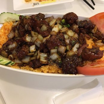 Joy Yee Noodle - Beef cubes and tomato over rice - Chinese Near Me - Chicago, Illinois