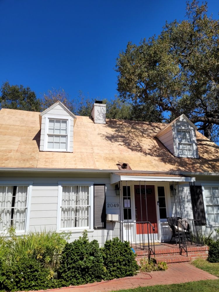 Slide of The Local Roofers and Builders